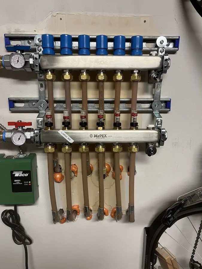 Plumber performing Water Heater Repair at a residential property in Huron