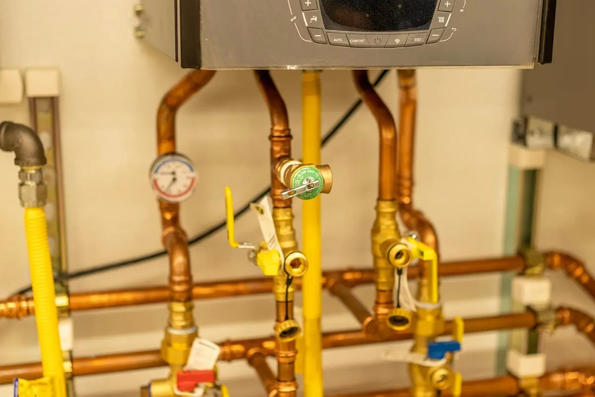 Licensed technician providing Backflow Prevention for a homeowner in Huron